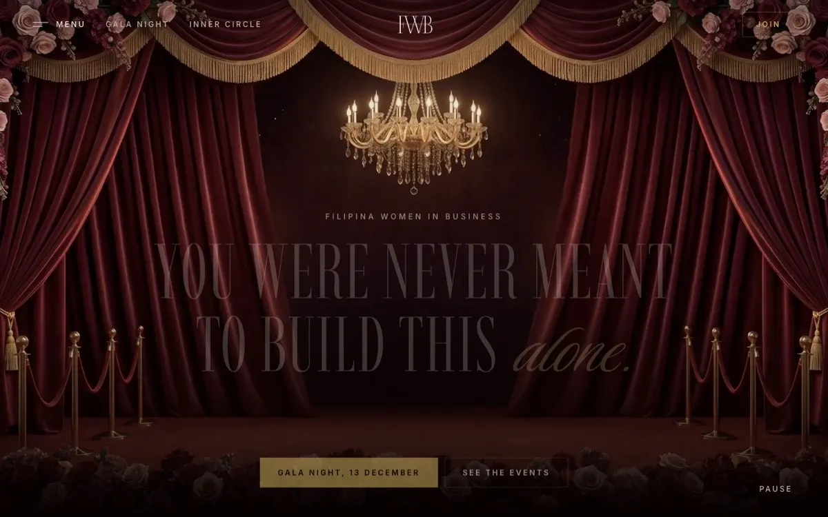 The Filipina Women in Business homepage, a theatre stage with a chandelier.